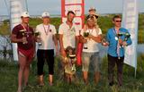 Ханкаец Илья Каравайкин (второй слева) достойно представил родной район на краевых соревнованиях по спортивной рыбалке