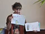 Библиотекарь из Алексеевки Елена Галкина показала коллегам рисунки своих юных читателей, на которых они изобразили героев басен Ивана Крылова