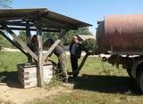 Работники МУП «ЖКХ» проводят работы по откачке грязной воды из колодцев в селе Комиссарово
