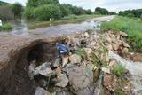 Огромный поток воды стал причиной обрушения аварийного участка автодороги, ведущей в Дворянку